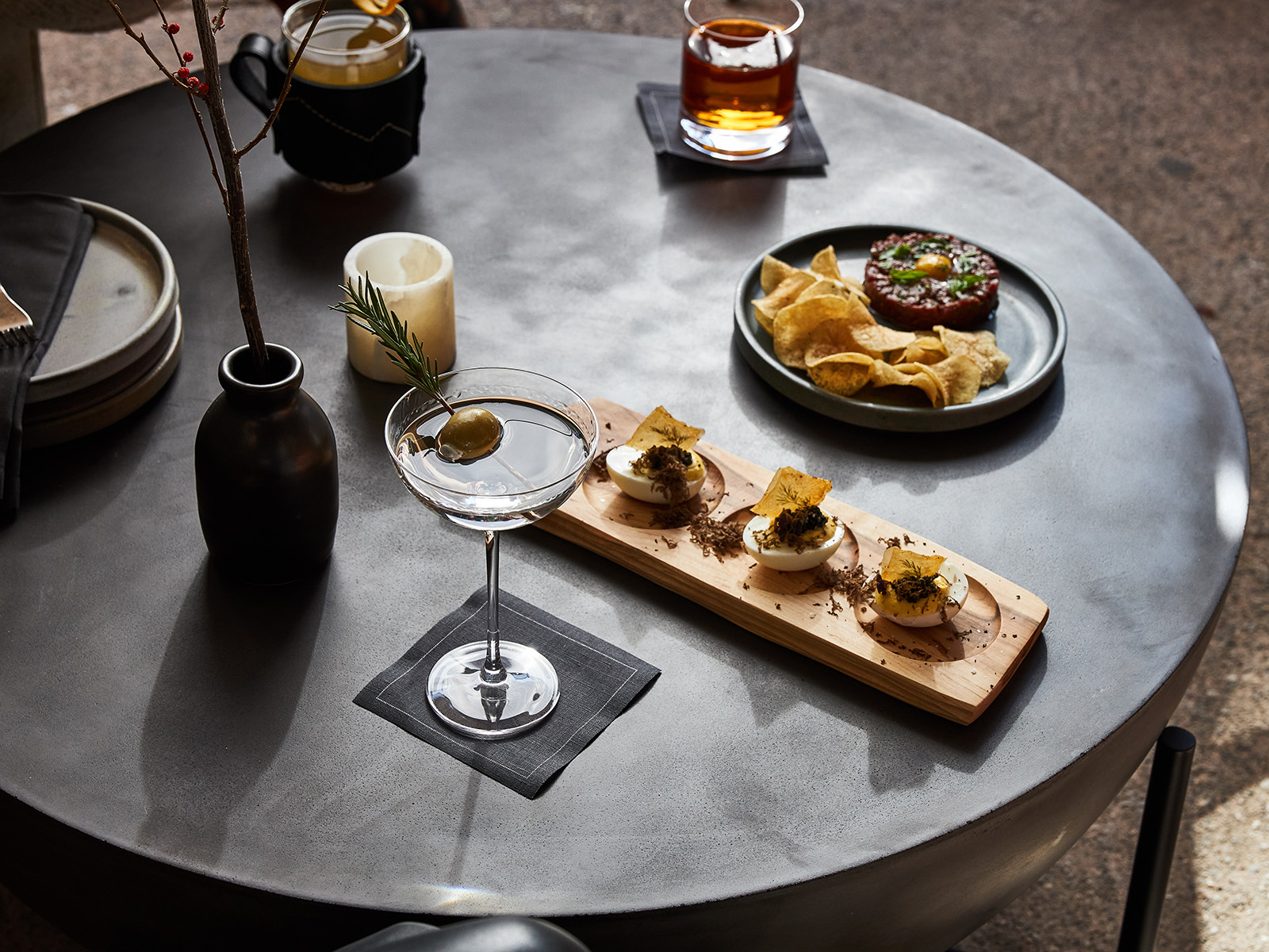 Martini and small bites on a table