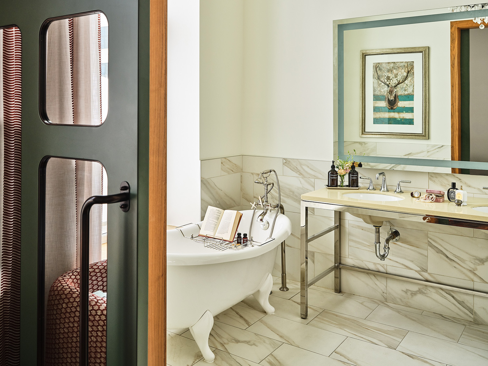 bathroom with a freestanding tub