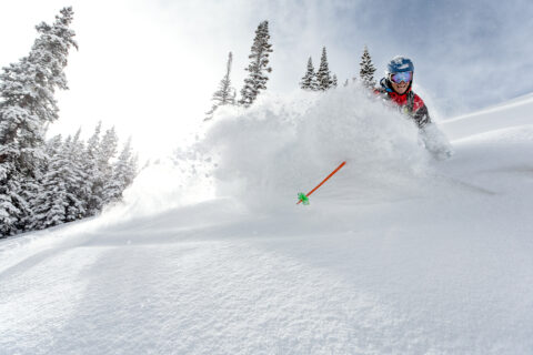 A very happy skier in waist-deep powder at Beaver Creek Resort in Colorado