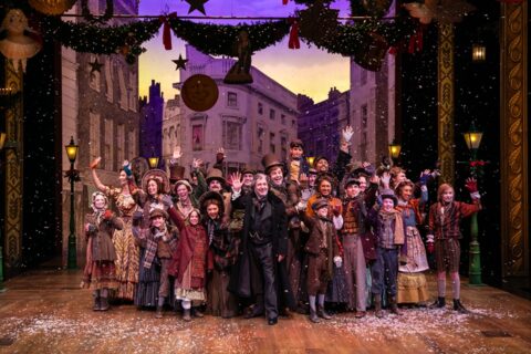 The cast of "A Christmas Carol" on stage