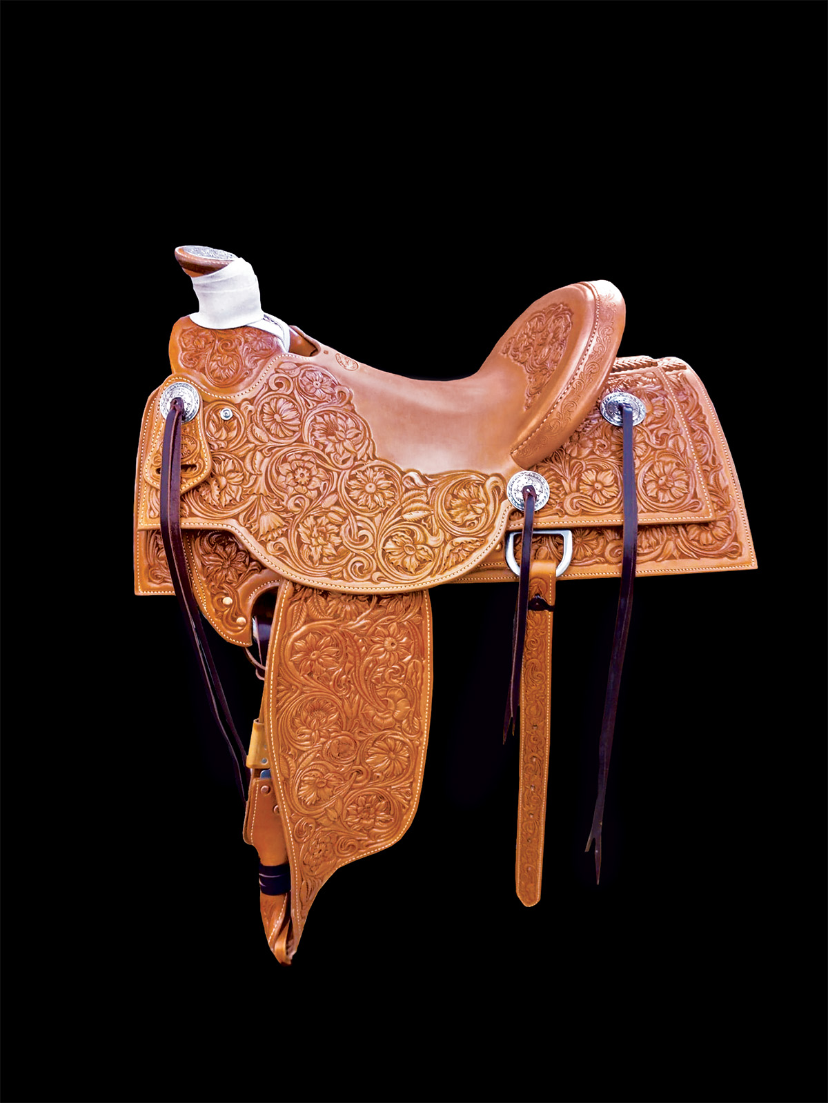 A beautiful saddle on a black background