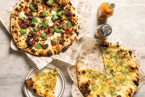 A seasonal pie with beef shank and arugula pesto and the pickle pizza
