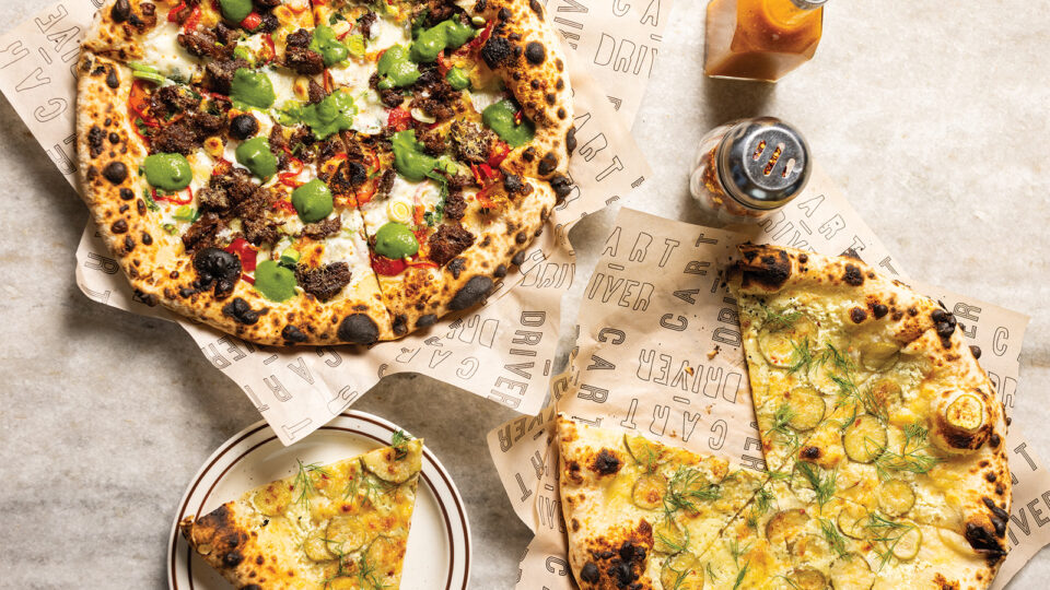 A seasonal pie with beef shank and arugula pesto and the pickle pizza