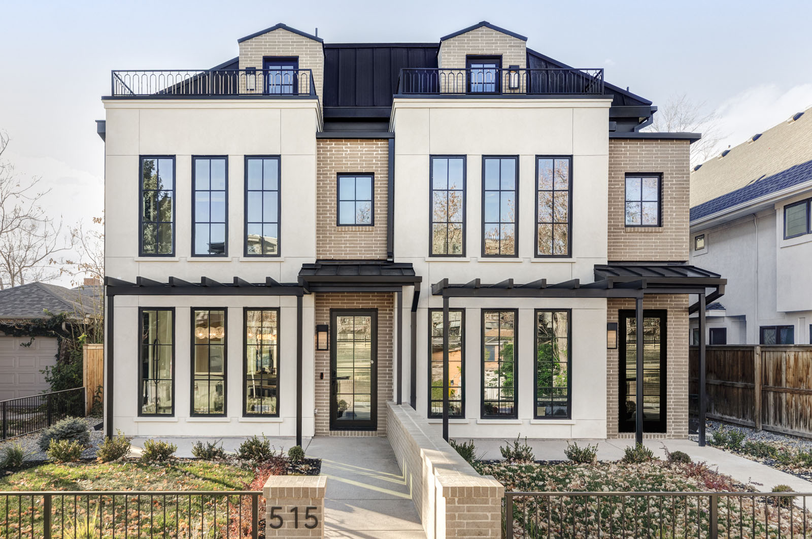 Facade of a modern townhome duplex