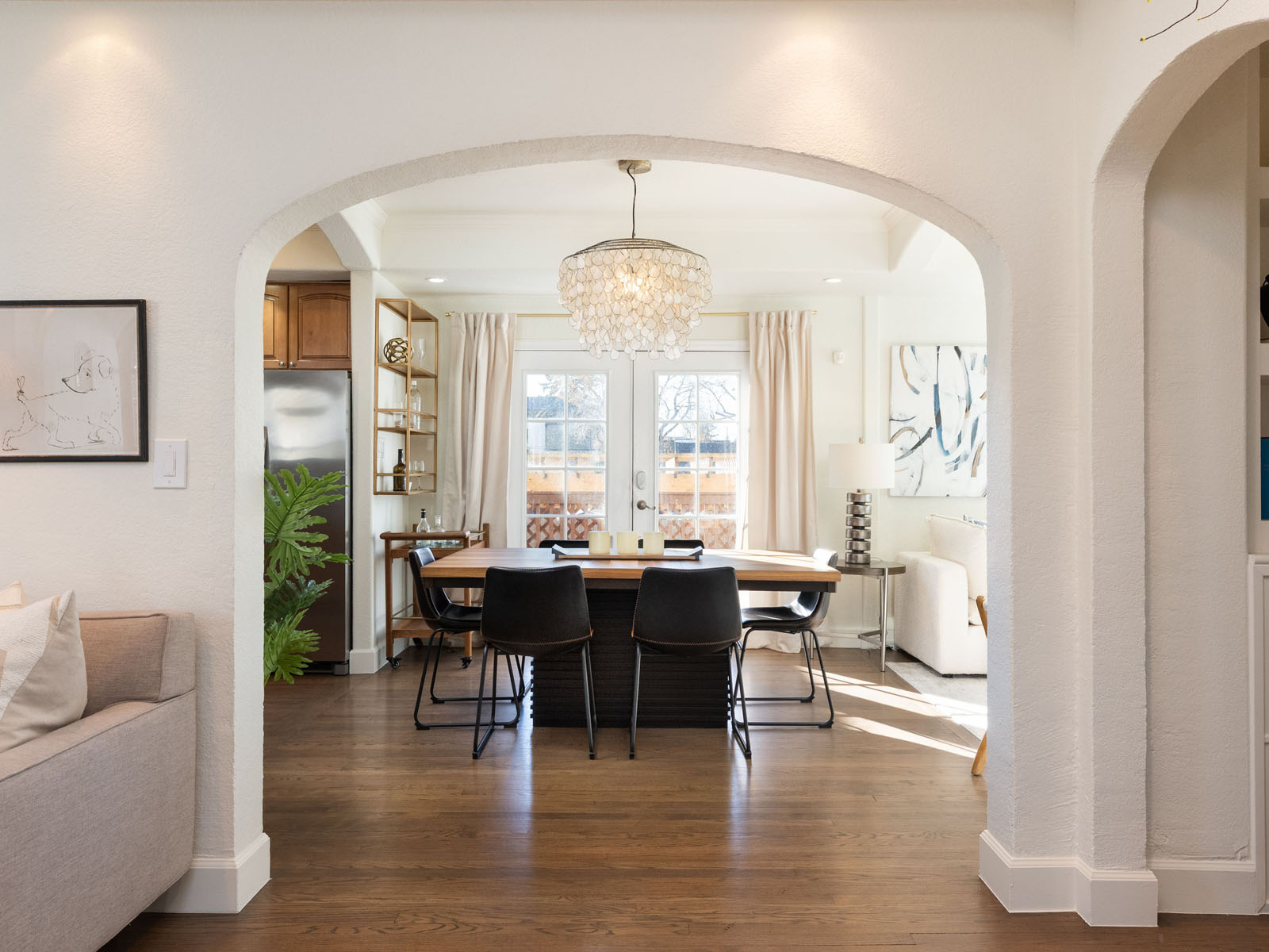 Formal dining room with a chandelier