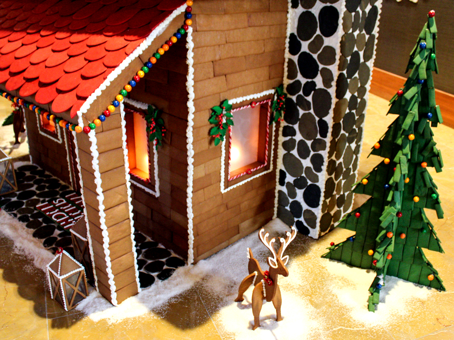 A life-size gingerbread cabin at the Gaylord Rockies Resort & Convention Center