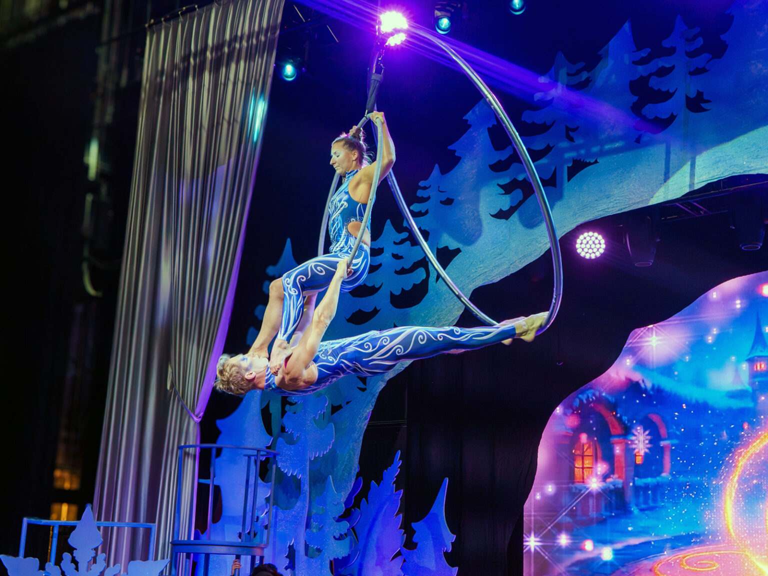 Acrobats suspended in the air