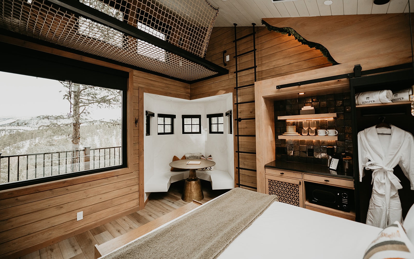 A treehouse dining nook and kitchenette