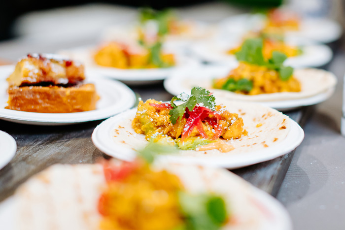 Small plates of food at a food event