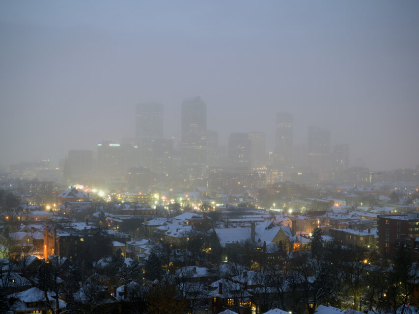 Denver skyline shrouded in fog on a winter night