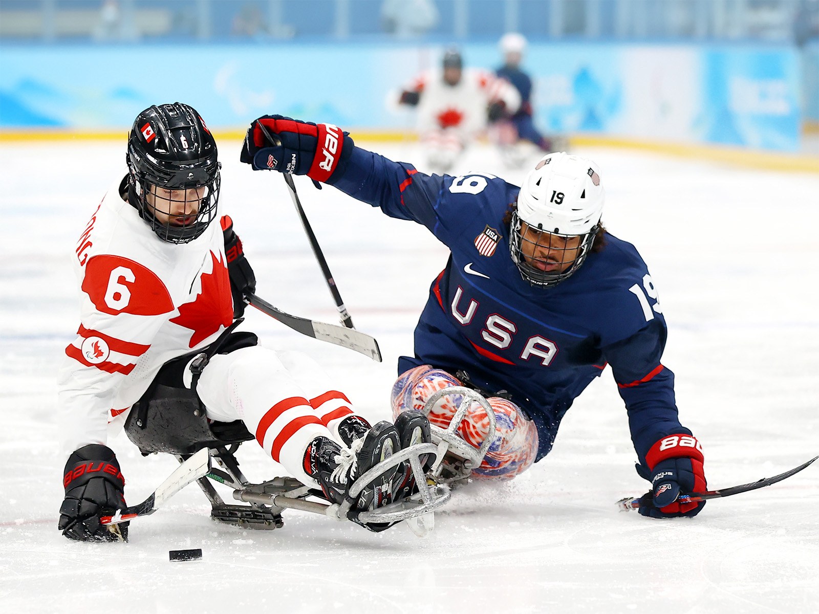 Malik Jones playing sled hockey
