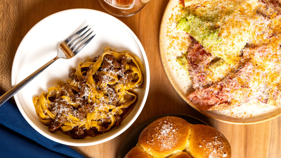 Merguez tagliatelle; rising brioche rolls; chicory “Caesar salad”