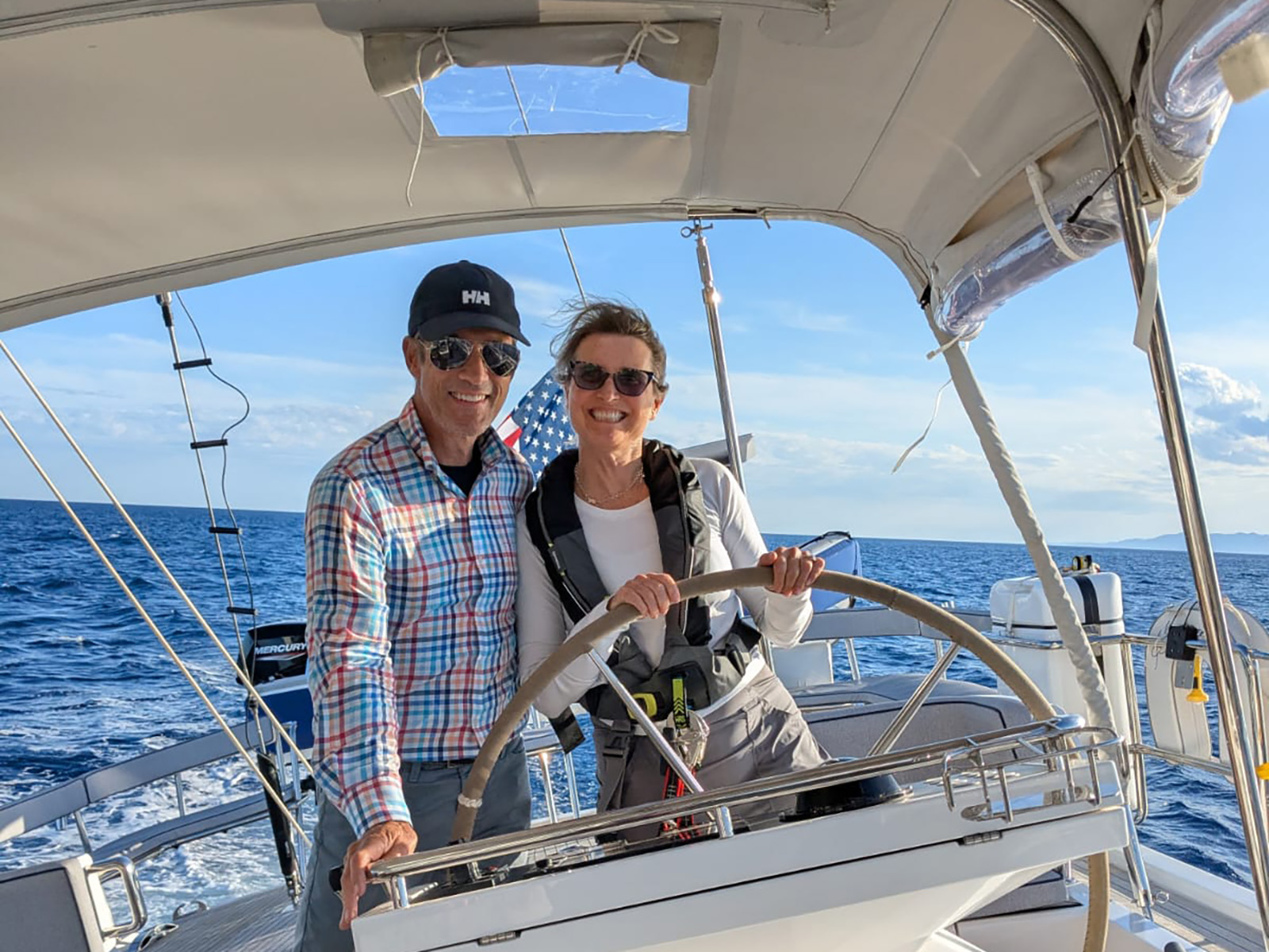 Two people in a sailboat