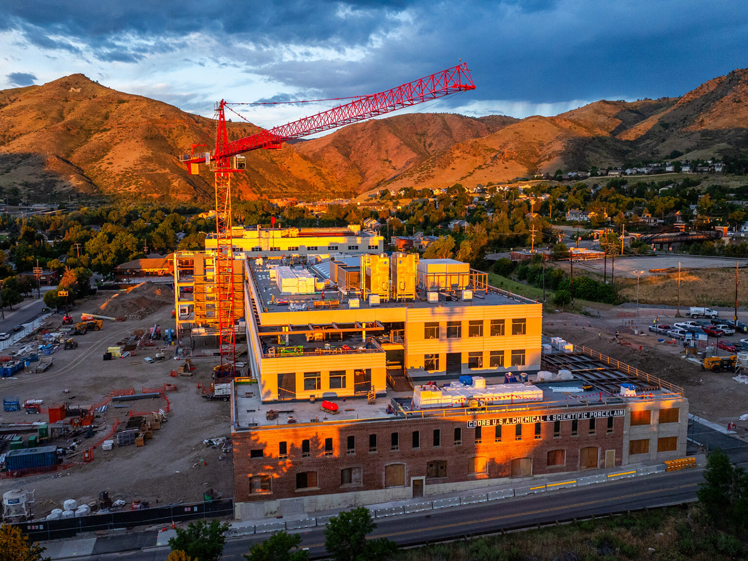 Old Coors Porcelain Company building with construction surrounding it