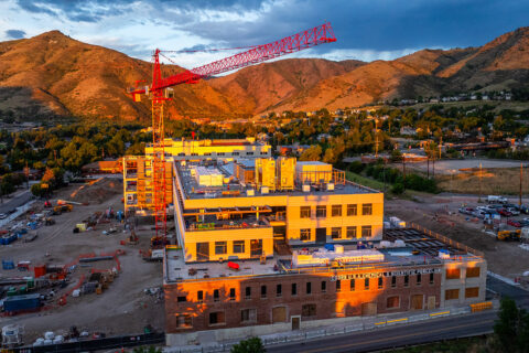 Old Coors Porcelain Company building with construction surrounding it