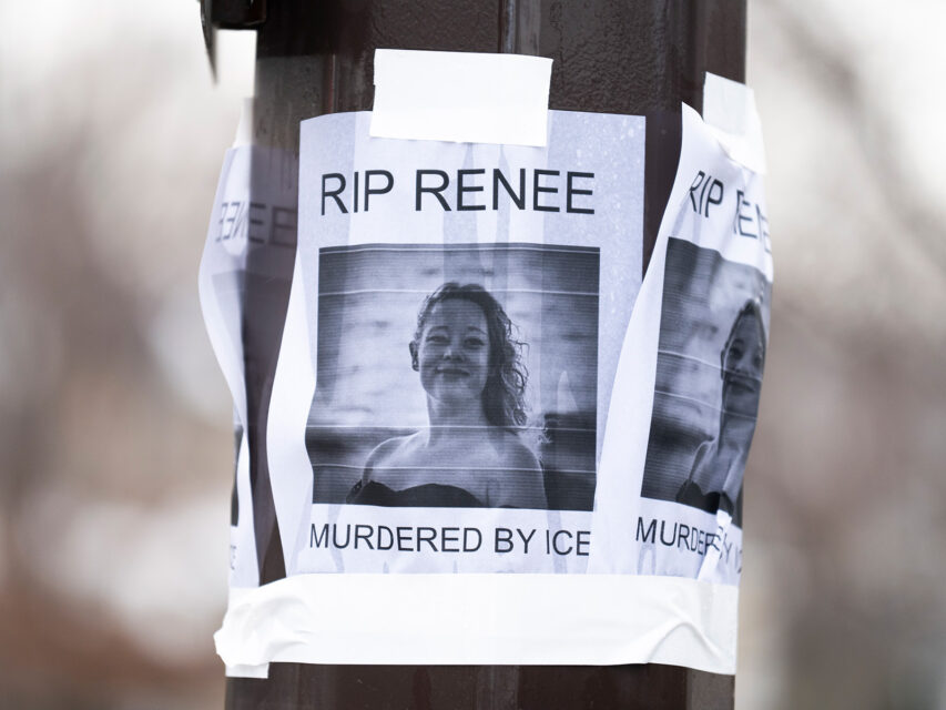 A portrait of Renee Nicole Good taped on a light pole