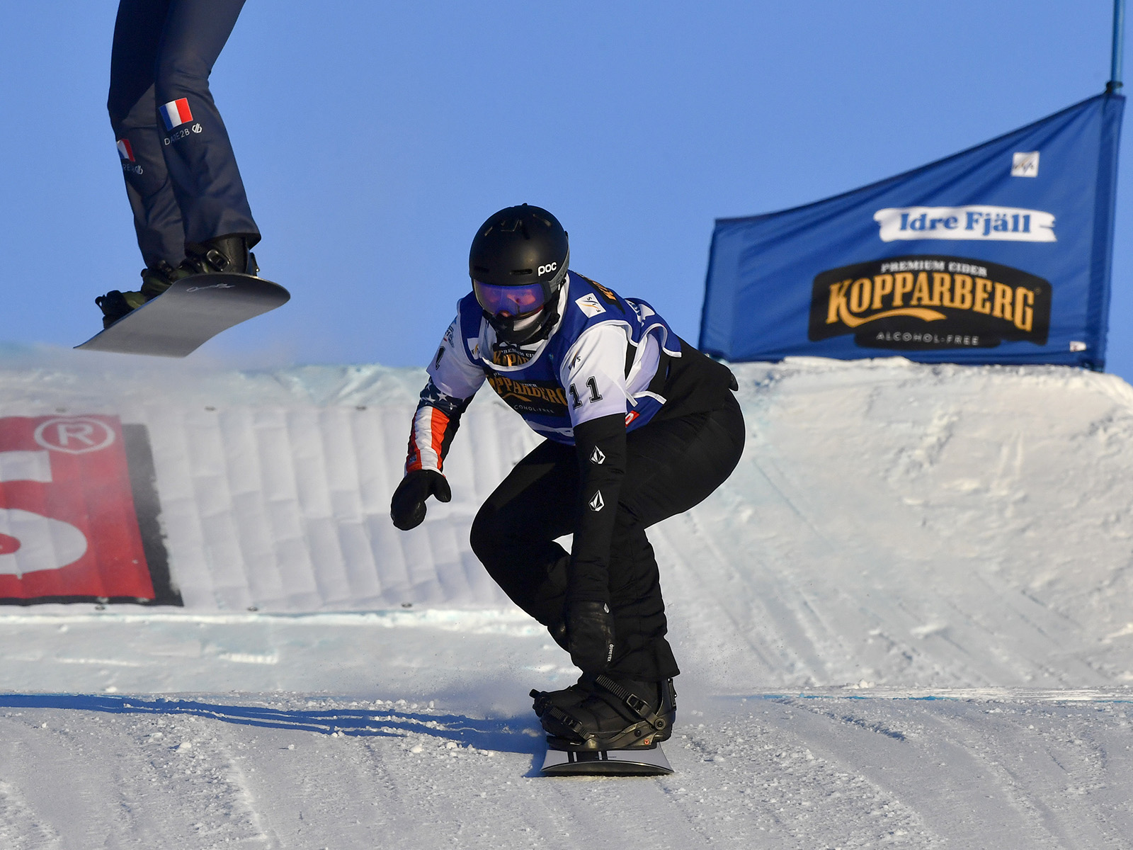 Stacy Gaskill competing in snowboard cross