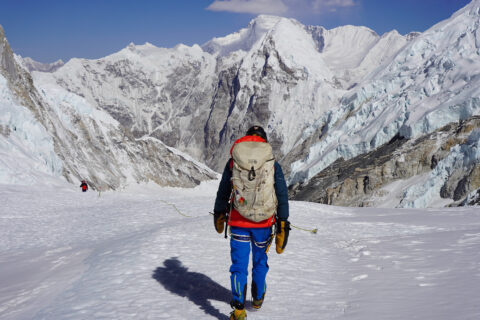 Man climbing Mount Everest