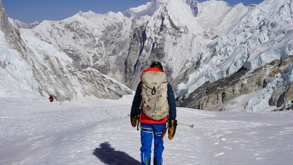 Man climbing Mount Everest