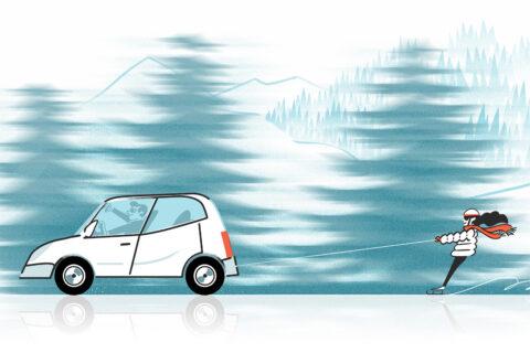 A person ice skating behind a car