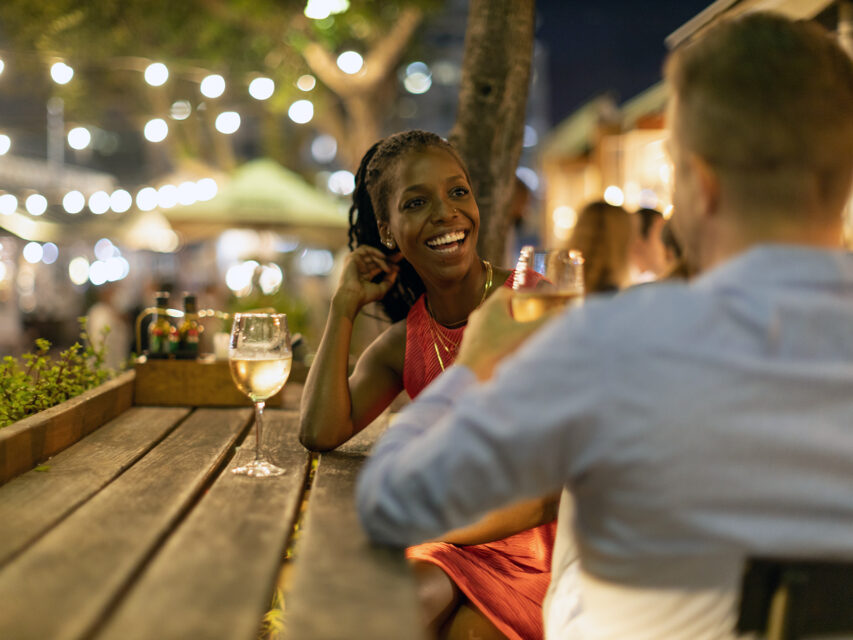 A woman and a man out to dinner without children