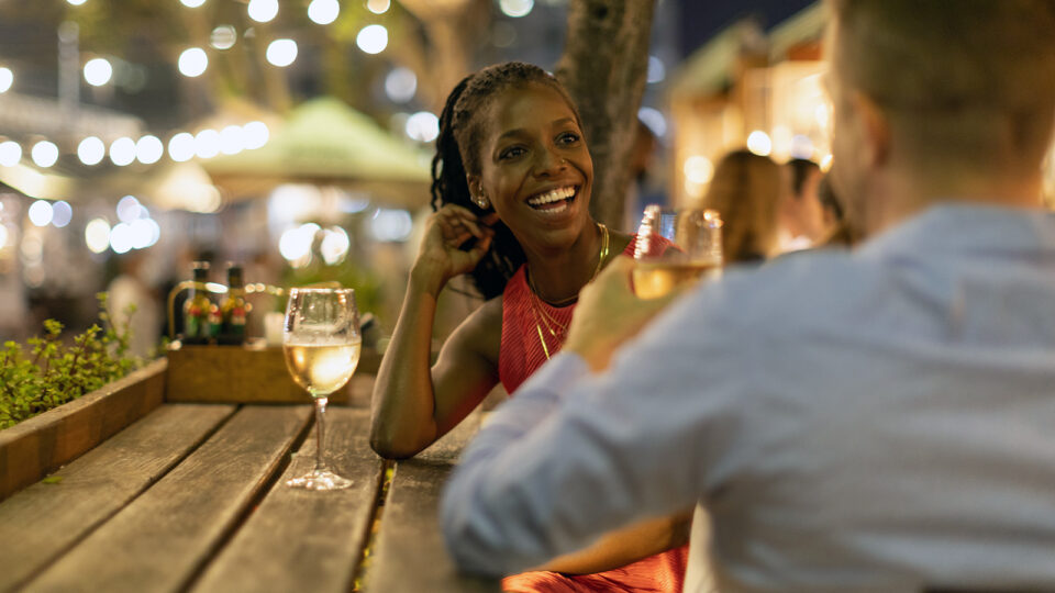A woman and a man out to dinner without children