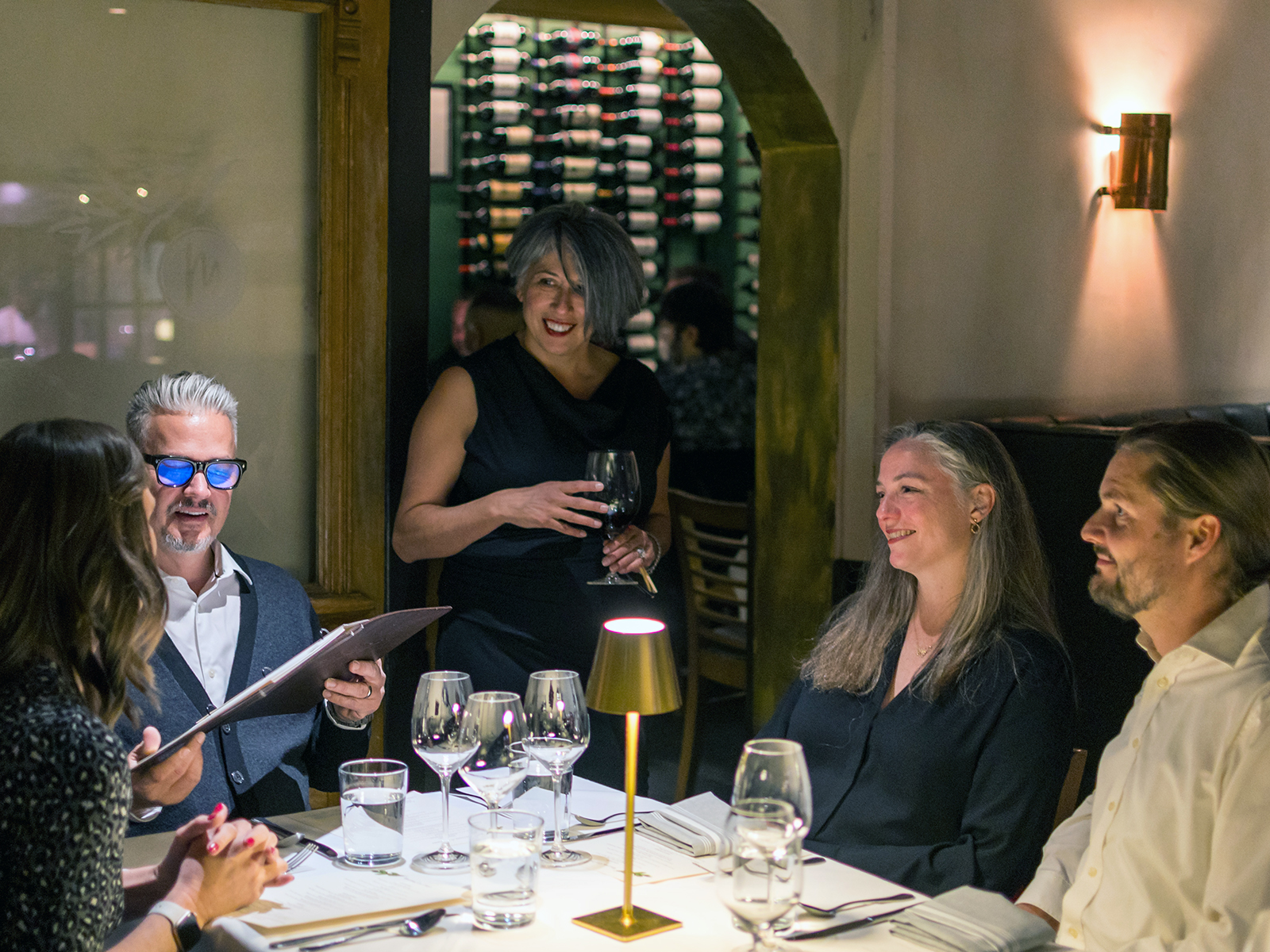 Two couples and a server at Mizuna