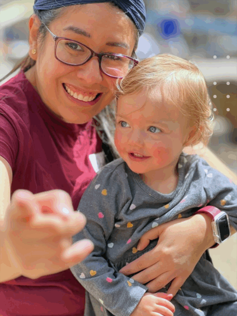 A babysitter and a happy kiddo