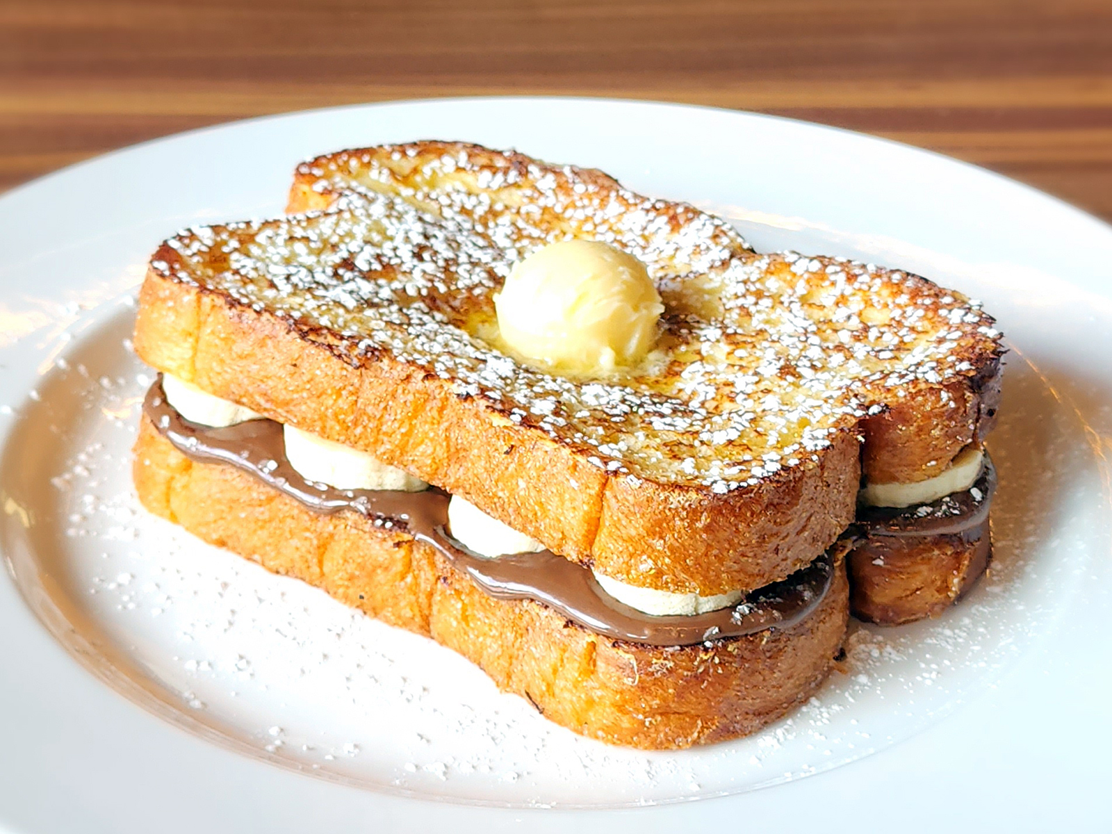 A French toast sandwich with Nutella and bananas