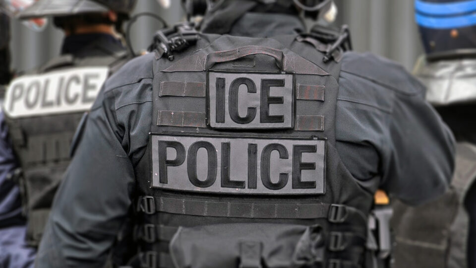 Back of an ICE police officer
