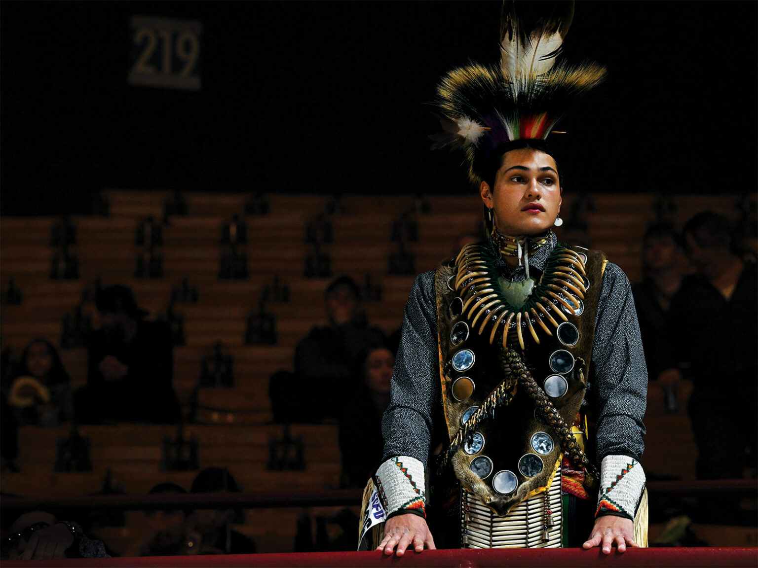 A dancer waits to perform at the Denver March Powwow