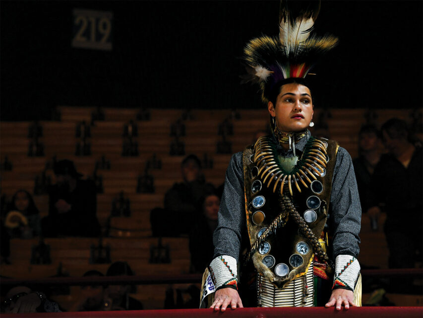 A dancer waits to perform at the Denver March Powwow