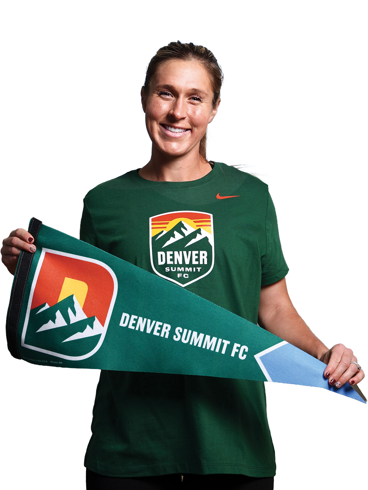 Jordan Baggett holding a Denver Summit FC banner