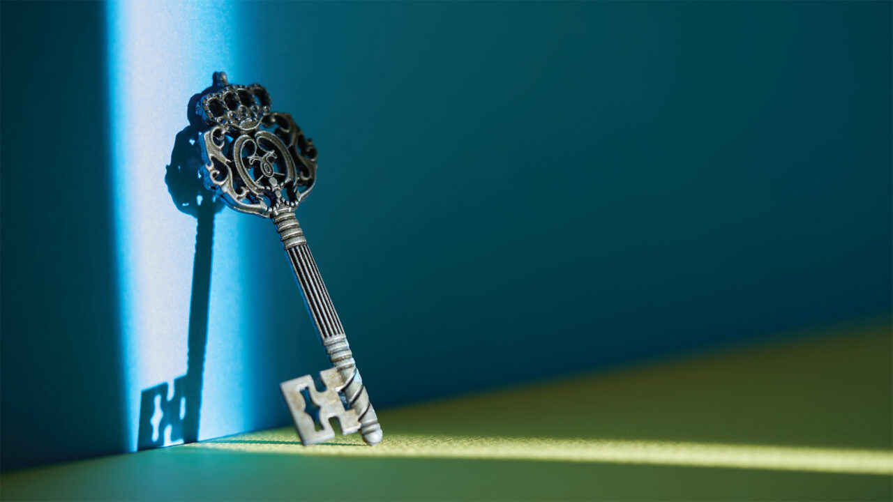 A key leaning against a wall