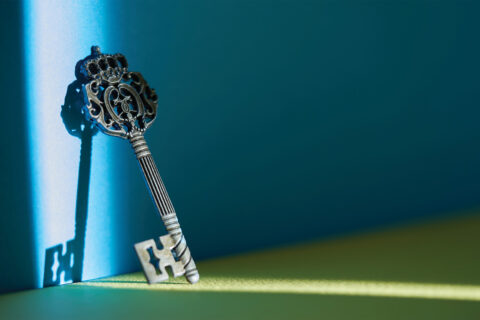 A key leaning against a wall