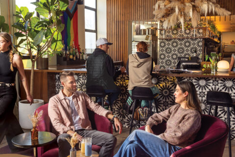 People mingling at coffeeshop Nest