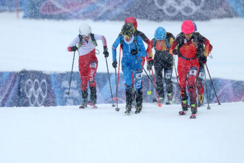 Women uphill during Olympic ski mountaineering sprint event