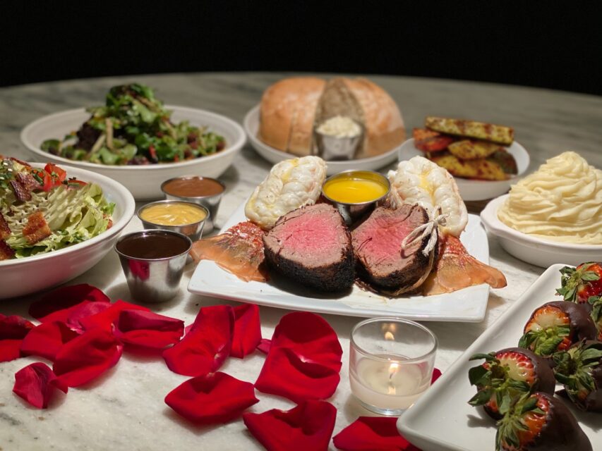 Dinner with roses on the table