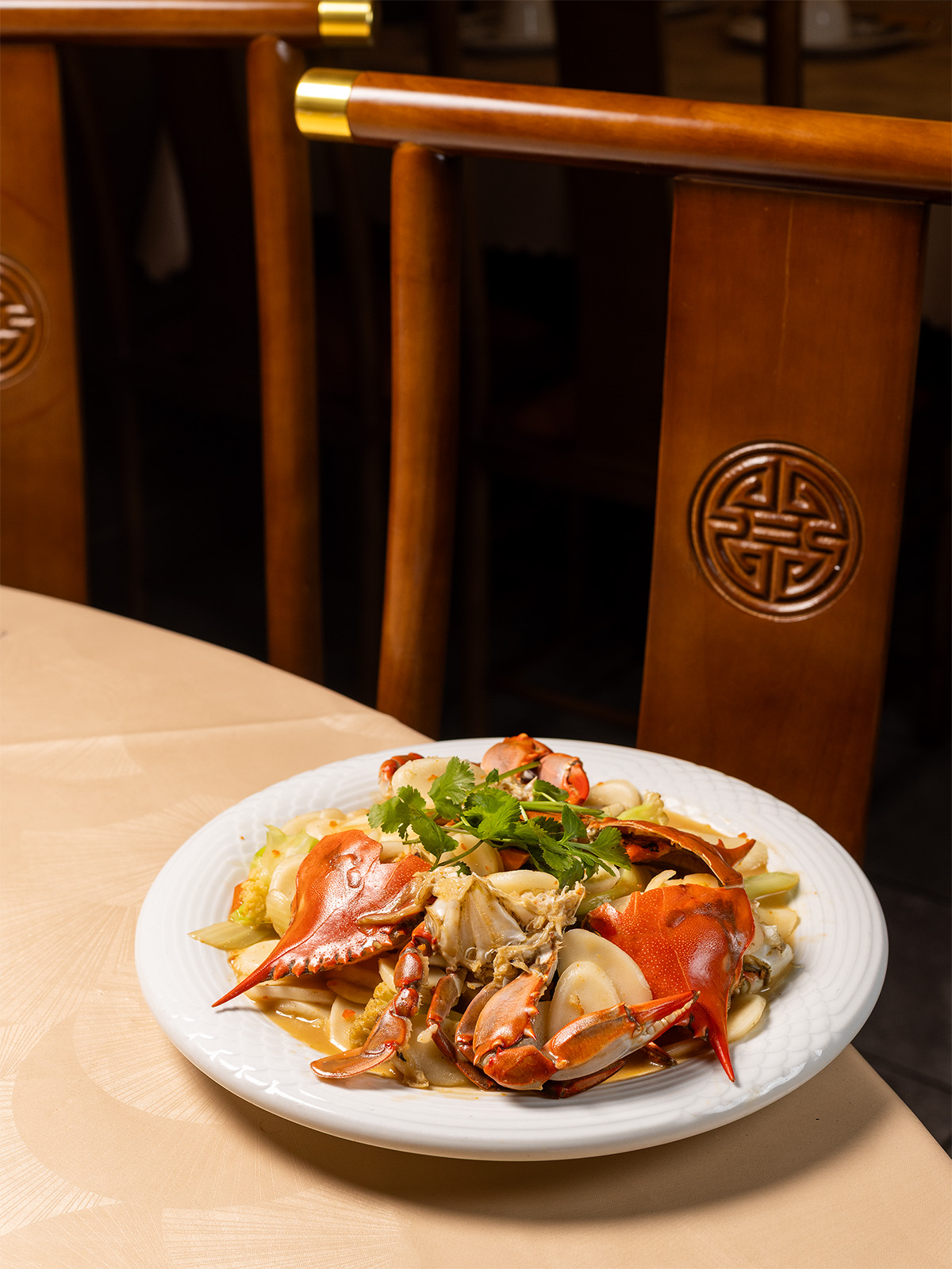 Stir-fried blue crab with rice cakes