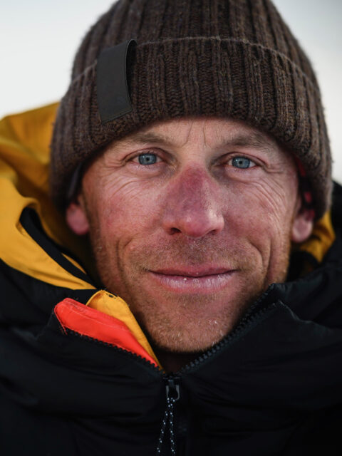 Jim Morrison wearing a parka and beanie