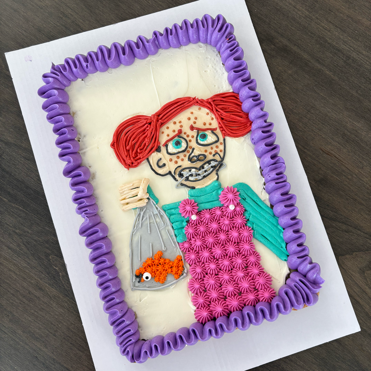 Darla from Finding Nemo on a cake