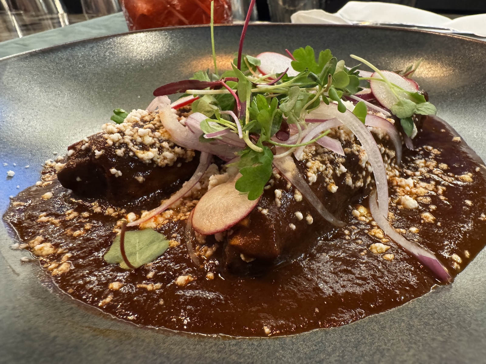 Flautas covered with mole