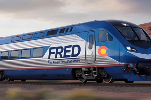 A blue and silver train named FRED