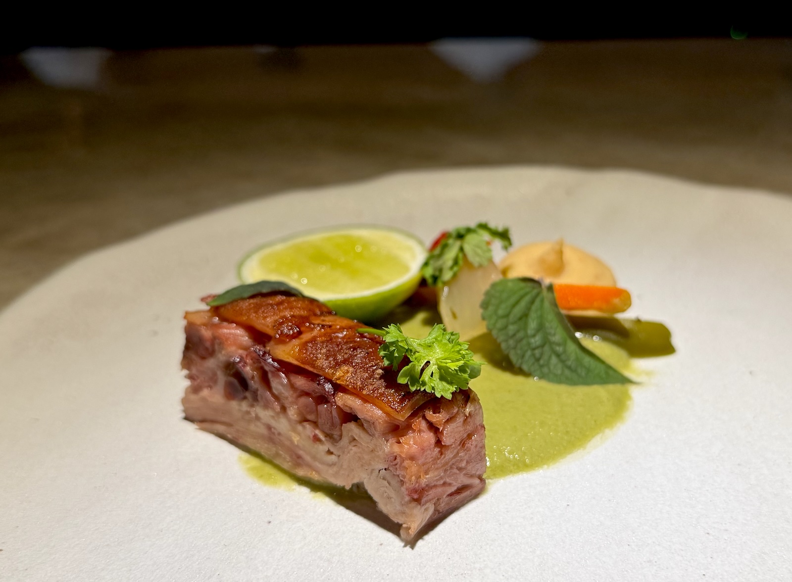 Slow-cooked pork with pipian verde at Milpero