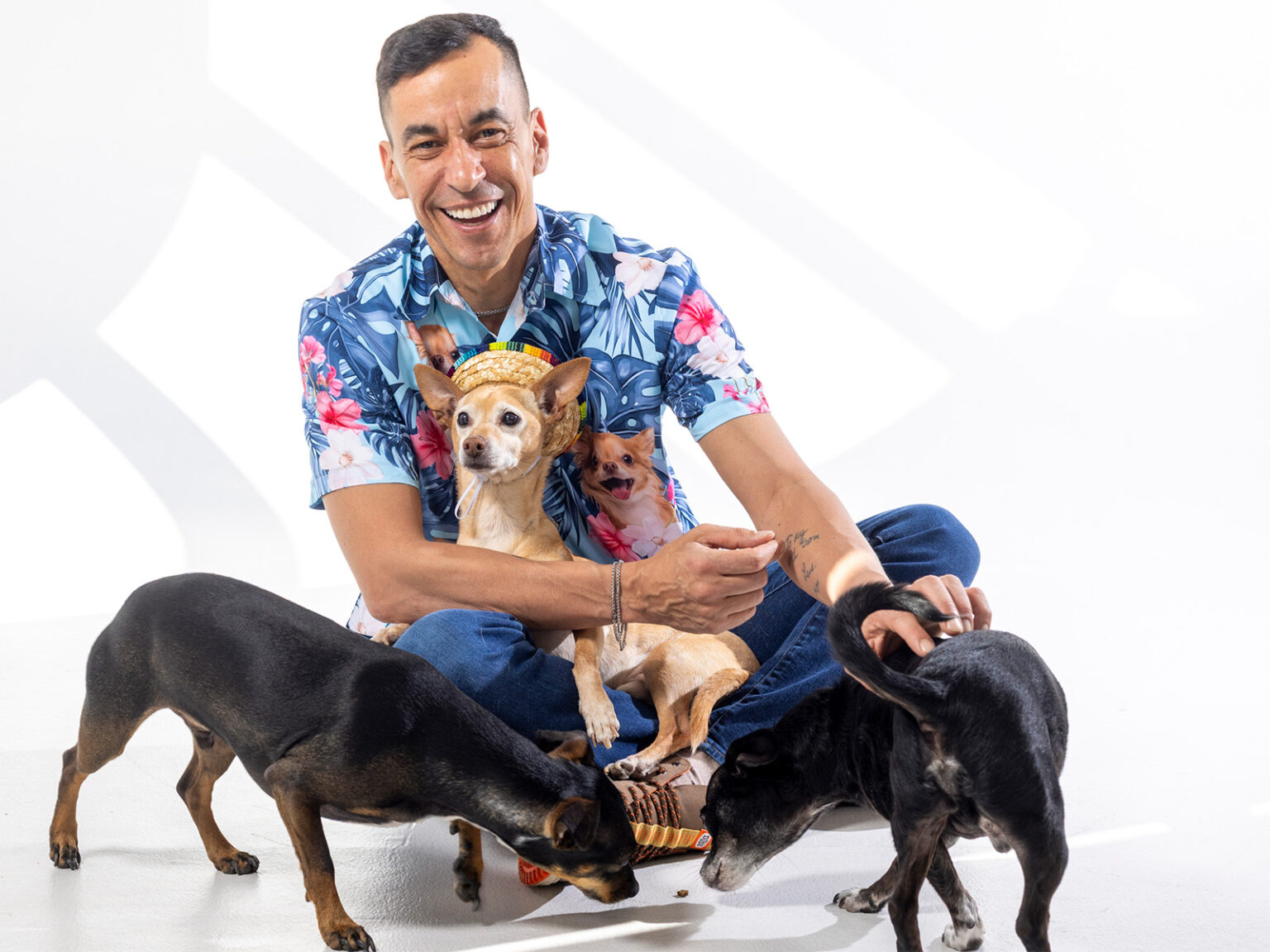 Senen “SLiM” Rodriguez and a bunch of chihuahuas