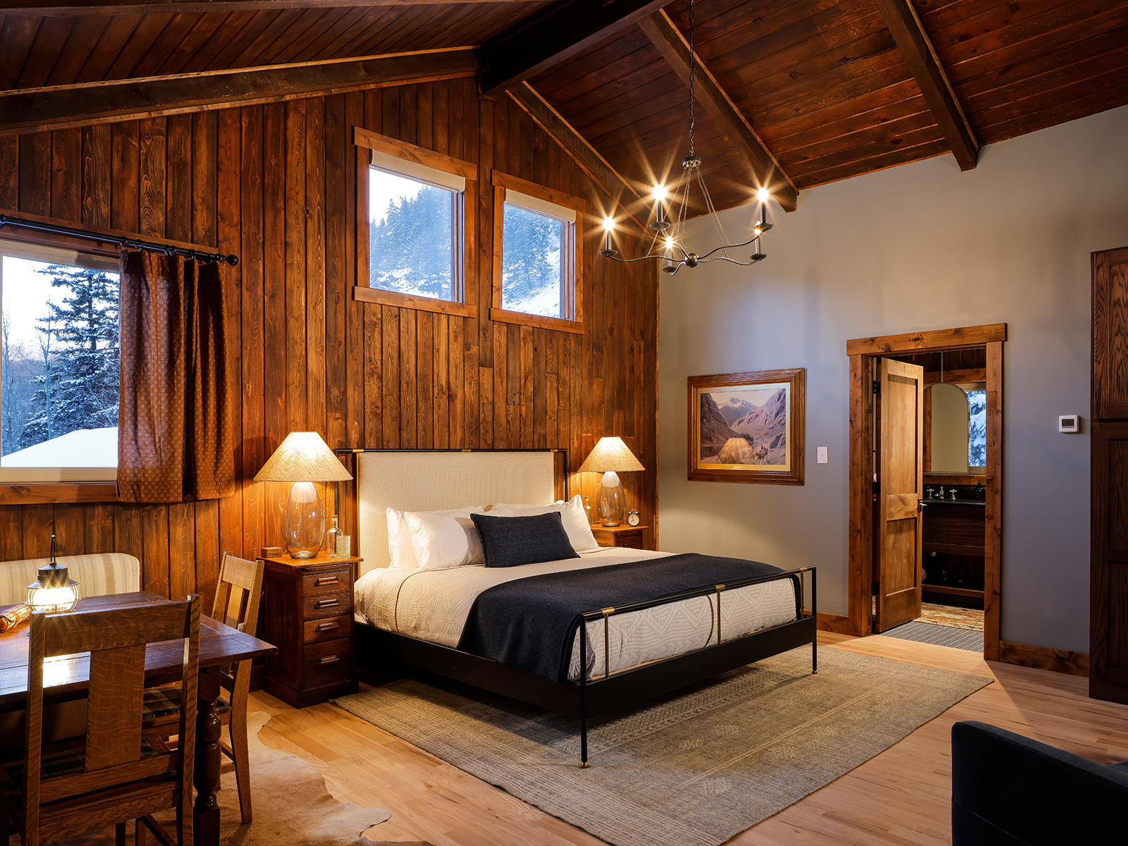 A spacious bedroom inside a cabin