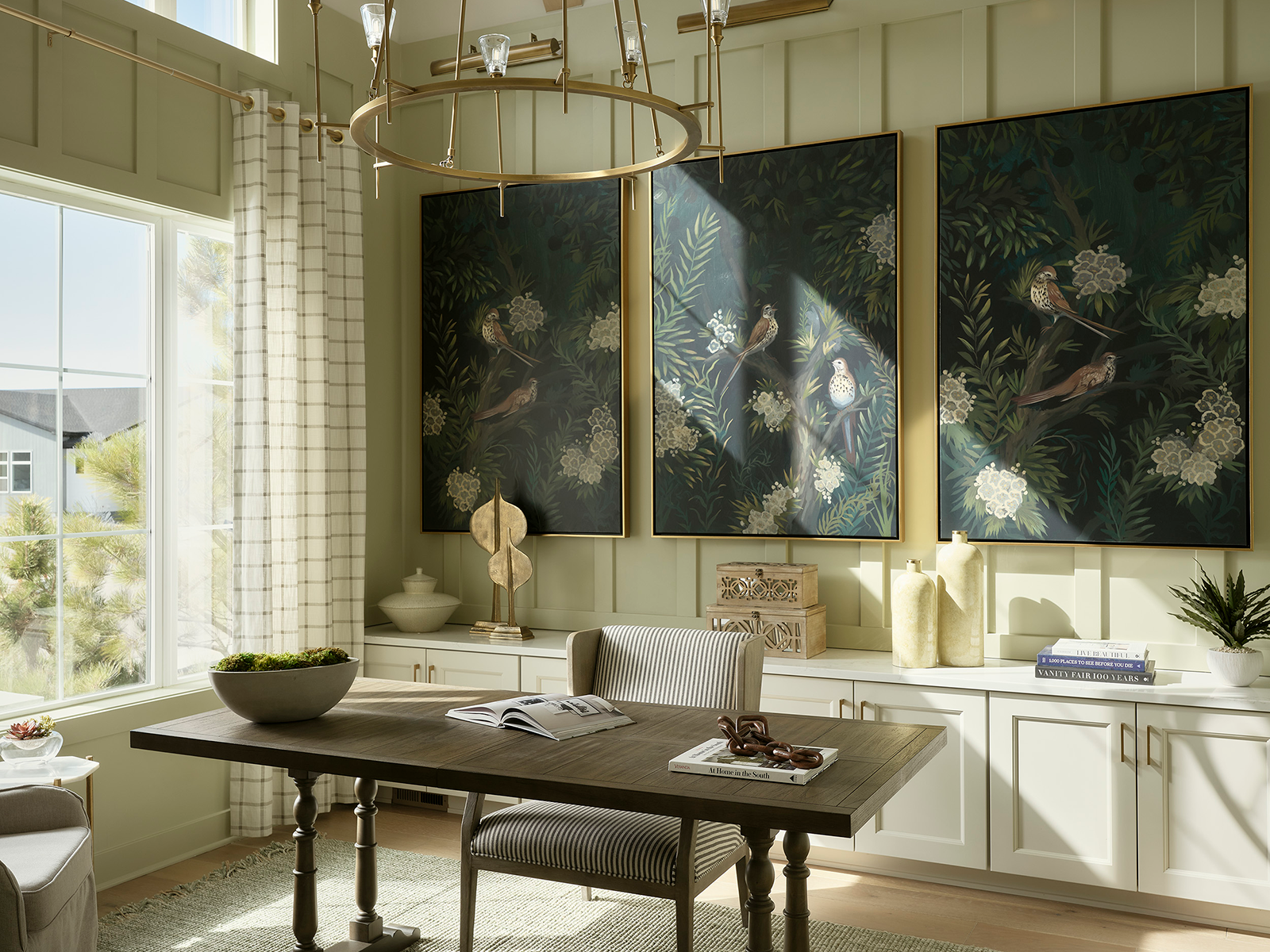 A study with a floral triptych painting on the back wall