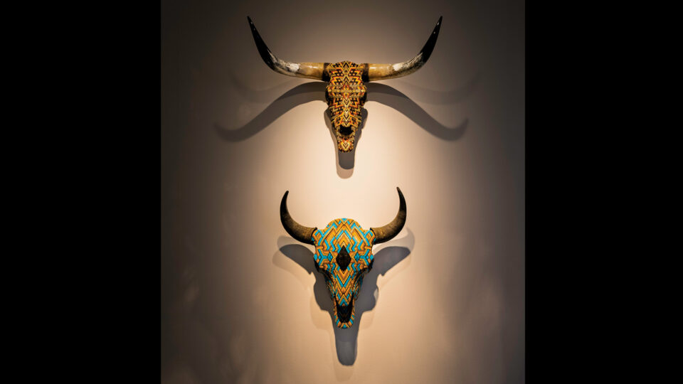 Skulls adorned with glass beads in the Madden Gallery at the Museum of Outdoor Arts in Greenwood Village