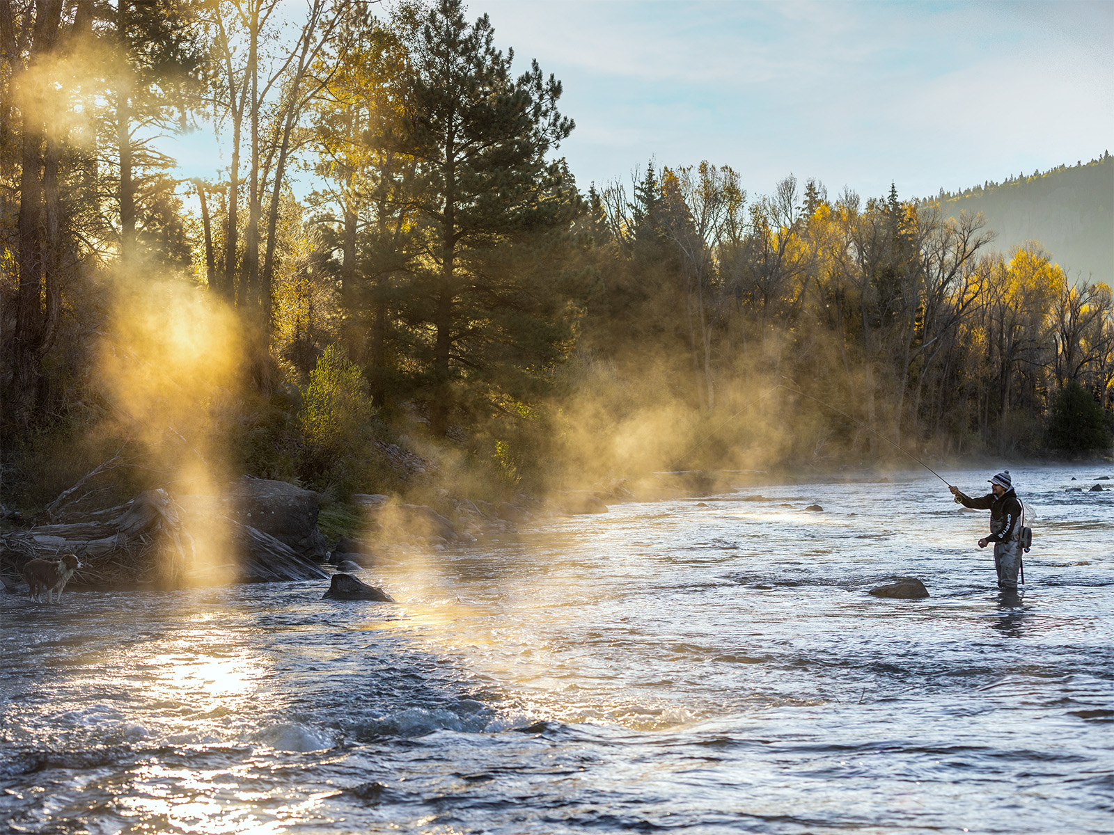 A man fishing at Rainbow Trout Ranch in Colorado