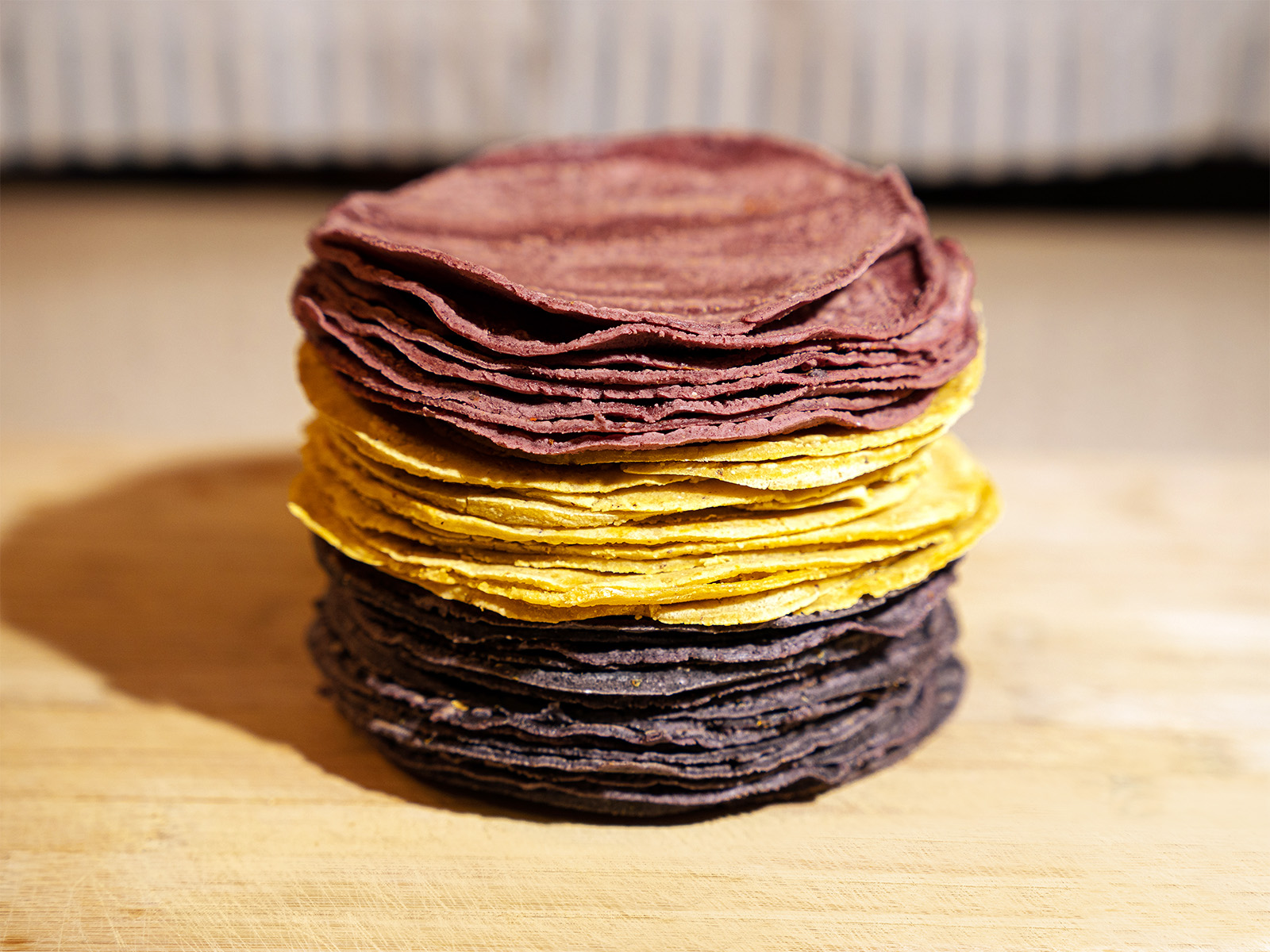 A stack of nixtamal tortillas